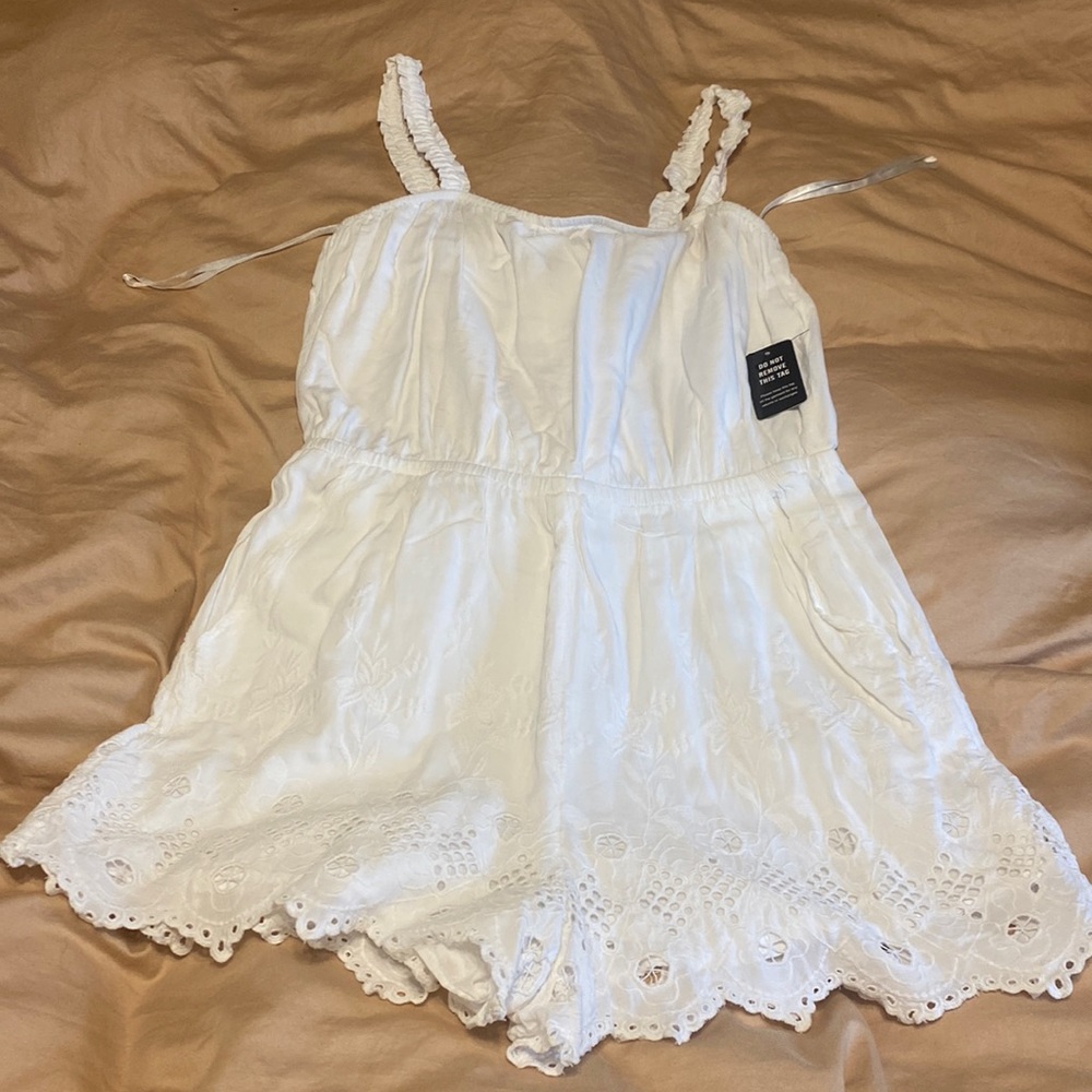 Brand new romper with pockets